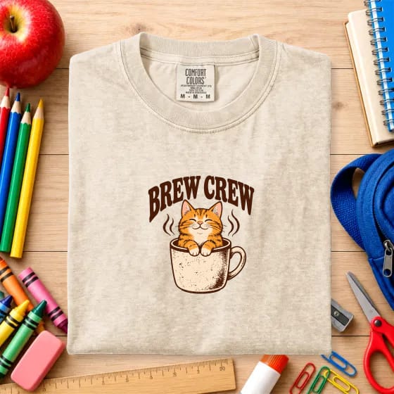 The same design on the same Ivory shirt, photographed on a Teacher background
